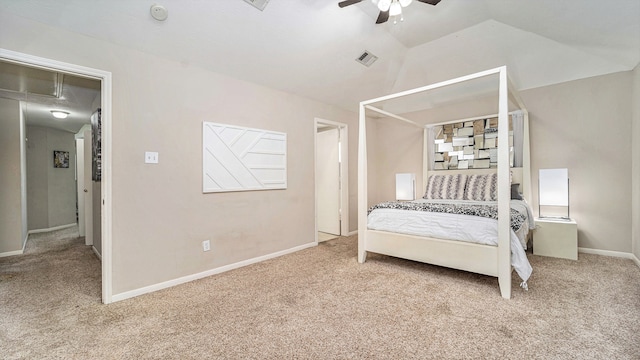 bedroom with light carpet, vaulted ceiling, and ceiling fan