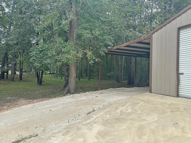 view of yard featuring a carport