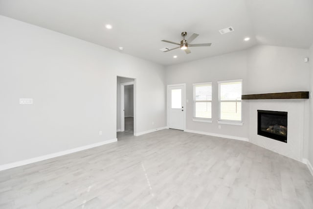 unfurnished living room with ceiling fan and light hardwood / wood-style flooring