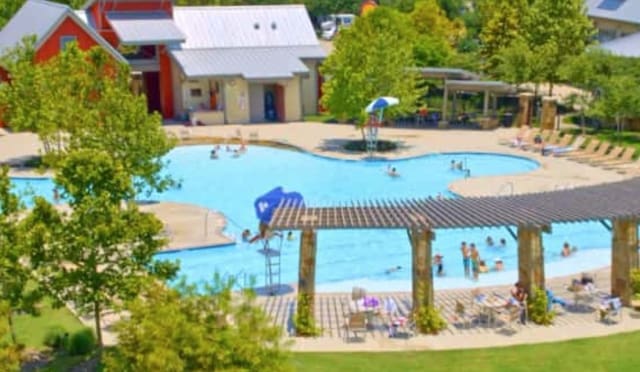 view of swimming pool with a patio