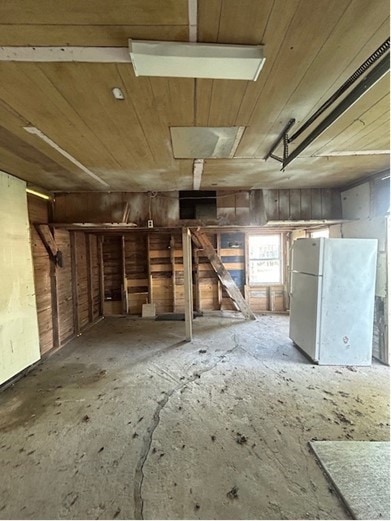 interior space with white fridge