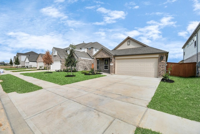 view of front of house with brick siding, fence, a garage, driveway, and a front lawn
