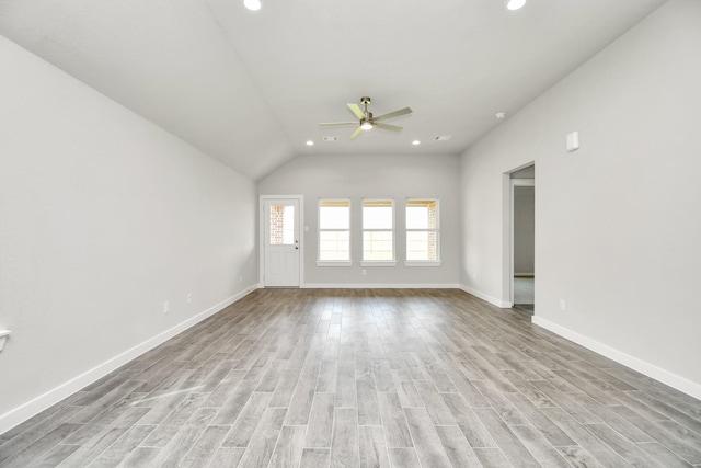 unfurnished living room with recessed lighting, a ceiling fan, light wood-style flooring, and vaulted ceiling