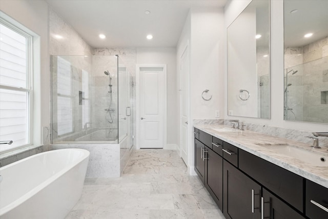 bathroom featuring tile patterned flooring, separate shower and tub, and vanity