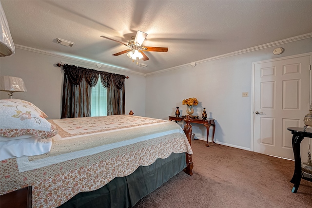 carpeted bedroom with ceiling fan, ornamental molding, and a textured ceiling