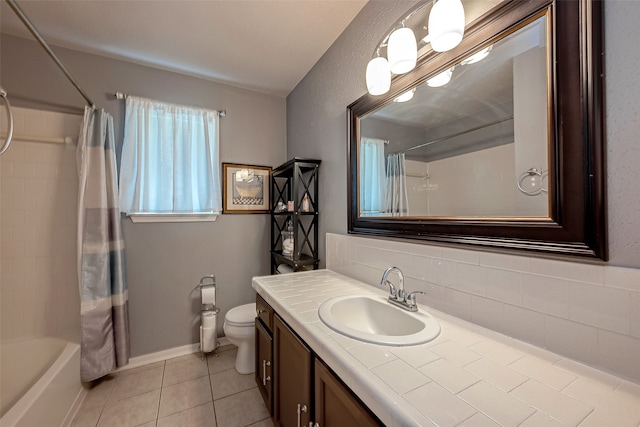 full bathroom featuring tile patterned flooring, toilet, vanity, and shower / bath combo