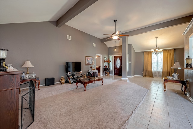 tiled living room featuring lofted ceiling with beams and ceiling fan with notable chandelier