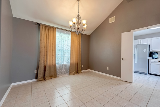 unfurnished room featuring light tile patterned floors, high vaulted ceiling, a notable chandelier, and plenty of natural light