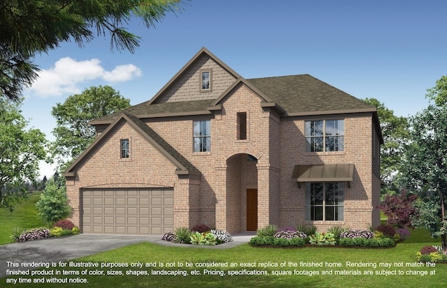 view of front of house with a garage and a front yard