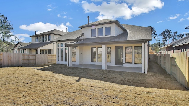 rear view of property with a patio