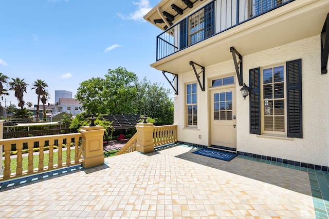 view of patio / terrace featuring a balcony