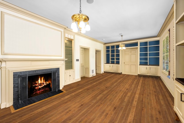 unfurnished living room with hardwood / wood-style flooring, crown molding, a high end fireplace, and built in shelves