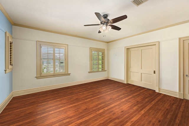 unfurnished bedroom with ceiling fan, ornamental molding, and wood-type flooring