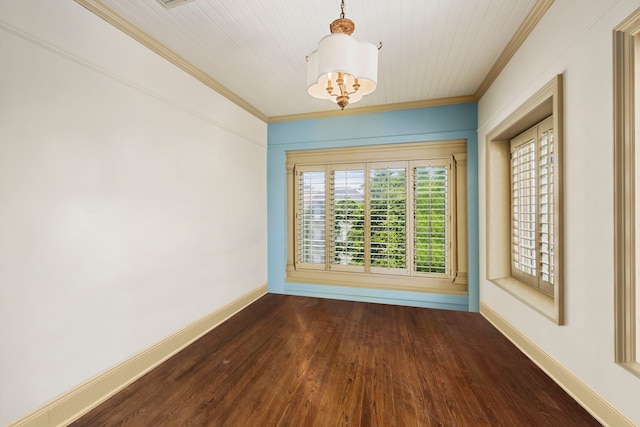 spare room featuring crown molding and wood-type flooring