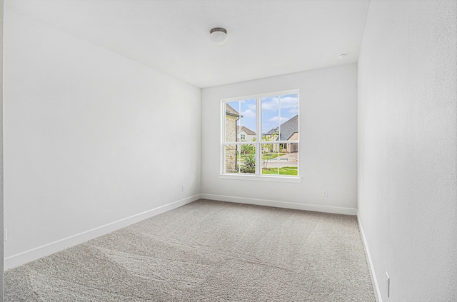 empty room with carpet floors