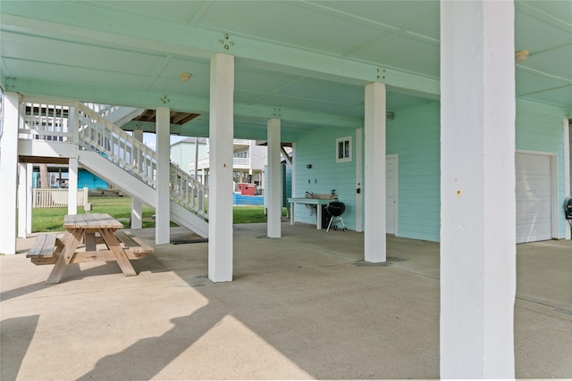 view of patio with a garage