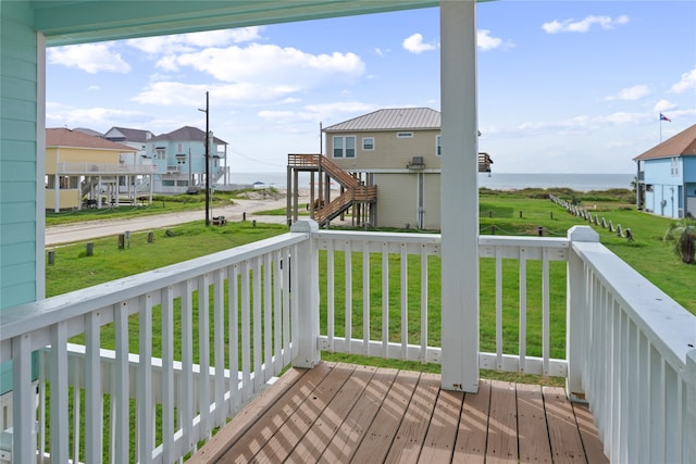 wooden terrace with a yard