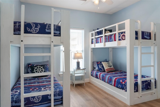 833 S Oneal Rd, Crystal Beach, TX 77650 - bedroom with wood finished floors and ceiling fan