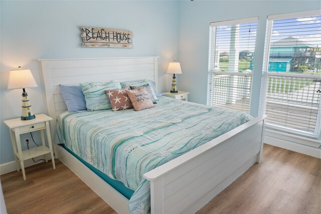 bedroom with light wood-type flooring