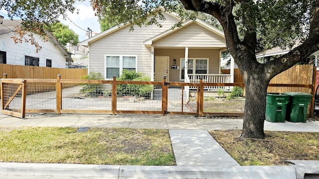 bungalow featuring covered porch