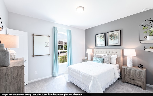 bedroom featuring light carpet