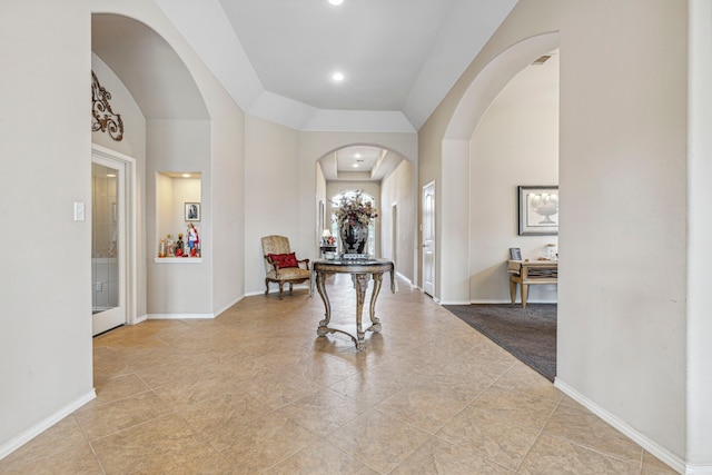 foyer entrance featuring light tile patterned floors