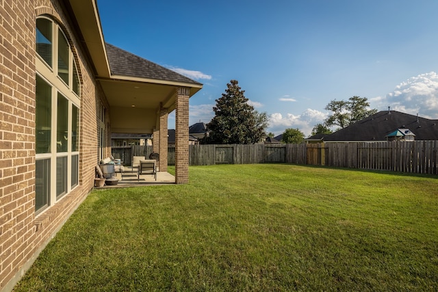 view of yard with a patio area