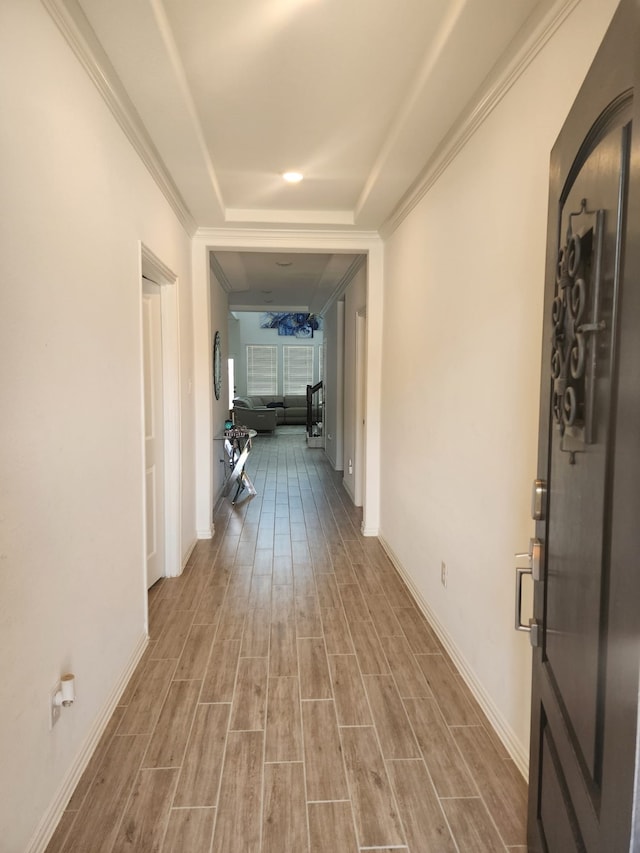 corridor featuring ornamental molding