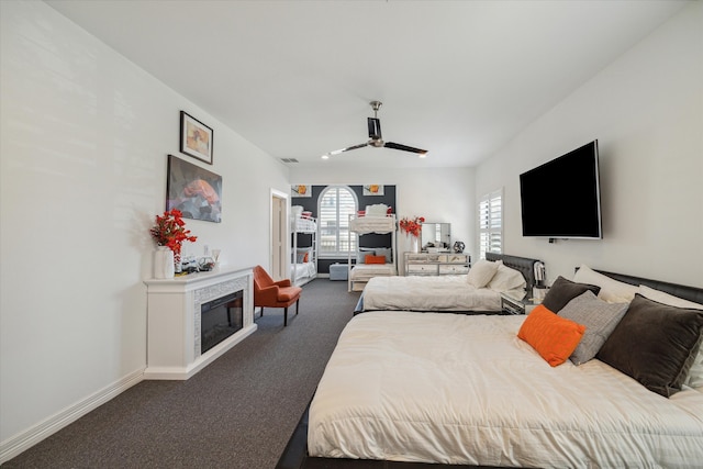 bedroom with carpet flooring and multiple windows