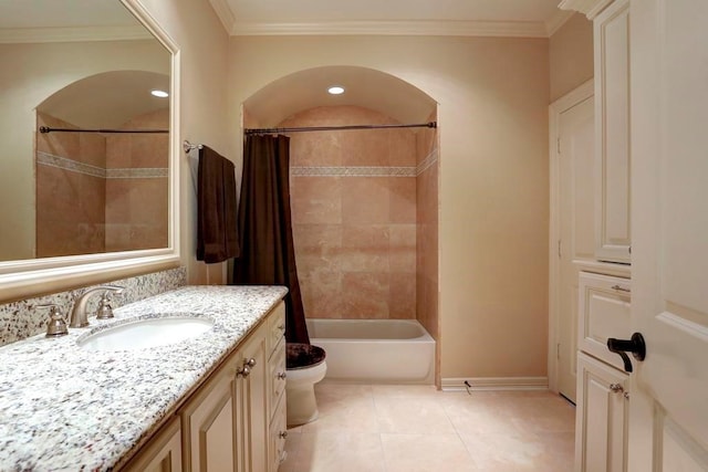 full bathroom featuring vanity, shower / bath combo with shower curtain, crown molding, tile patterned floors, and toilet