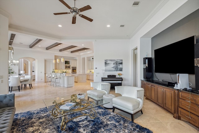 living room featuring ceiling fan, light tile patterned floors, beamed ceiling, and crown molding