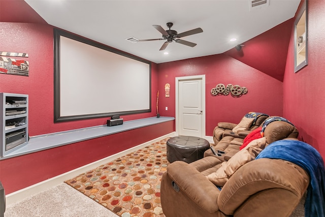 home theater room with ceiling fan