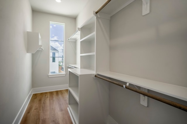 walk in closet featuring light wood-type flooring