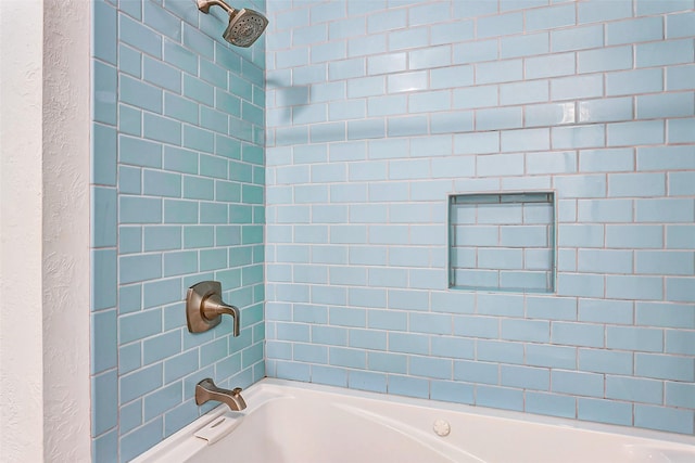 full bath featuring washtub / shower combination