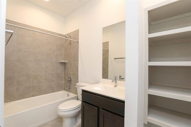 full bathroom featuring toilet, tiled shower / bath combo, vanity, and built in features