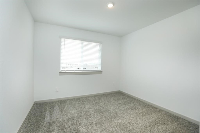 empty room with carpet flooring