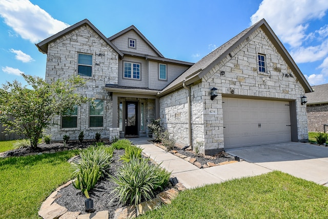 craftsman-style home with a garage and a front yard