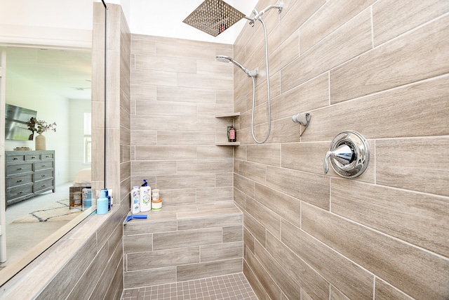 bathroom with a tile shower