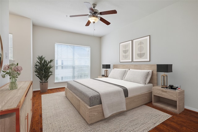 bedroom with ceiling fan and hardwood / wood-style flooring