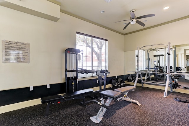 gym with carpet floors, ceiling fan, and ornamental molding