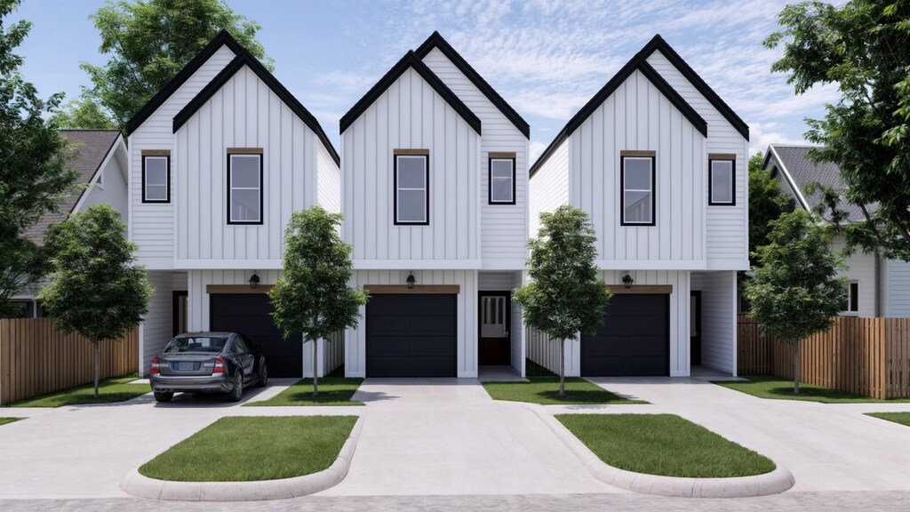 modern farmhouse style home featuring a garage