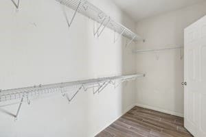 walk in closet featuring dark wood-type flooring