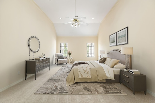 bedroom featuring crown molding, light colored carpet, a ceiling fan, high vaulted ceiling, and baseboards