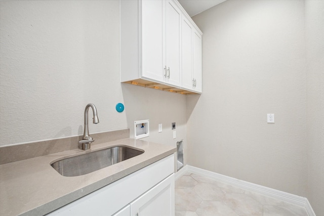 502 Amalfi Dr, Kemah, TX 77565 - washroom featuring electric dryer hookup, washer hookup, cabinet space, baseboards, and light tile patterned floors