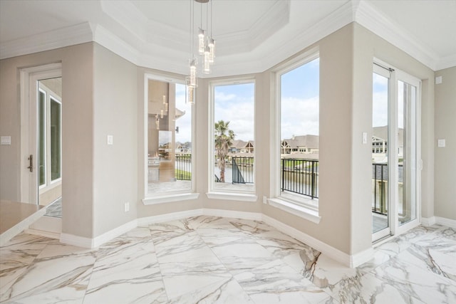502 Amalfi Dr, Kemah, TX 77565 - unfurnished dining area with ornamental molding, a water view, marble finish floors, a tray ceiling, and baseboards