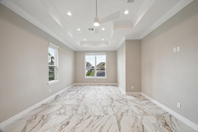 502 Amalfi Dr, Kemah, TX 77565 - unfurnished room with a tray ceiling, ornamental molding, recessed lighting, light marble finish floors, and a ceiling fan