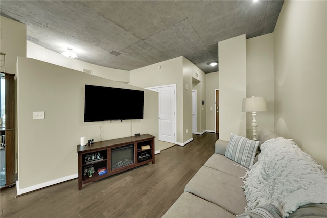 living room with dark wood-type flooring