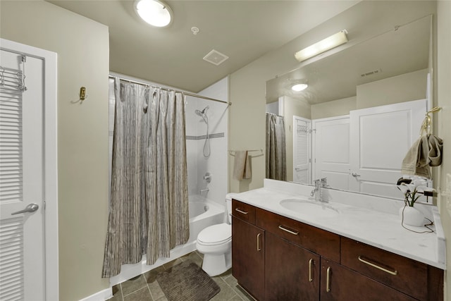 full bathroom with tile patterned floors, toilet, shower / tub combo, and vanity