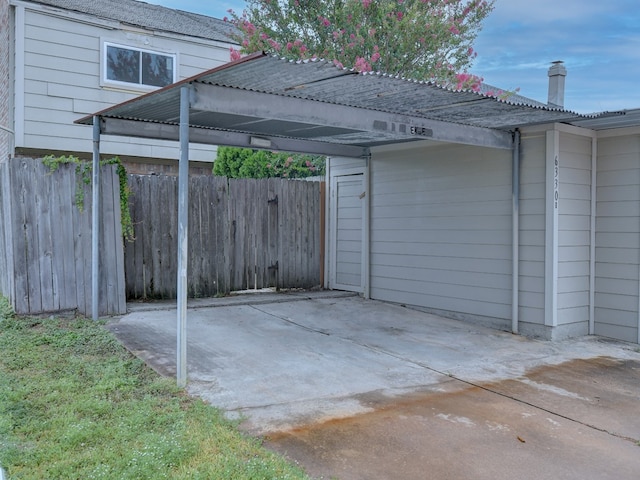 view of patio / terrace featuring a carport