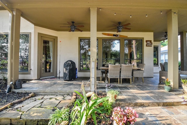 view of patio with ceiling fan